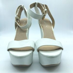 Aldo White High Heeled 5" Platforms size 8, ankle wrap straps